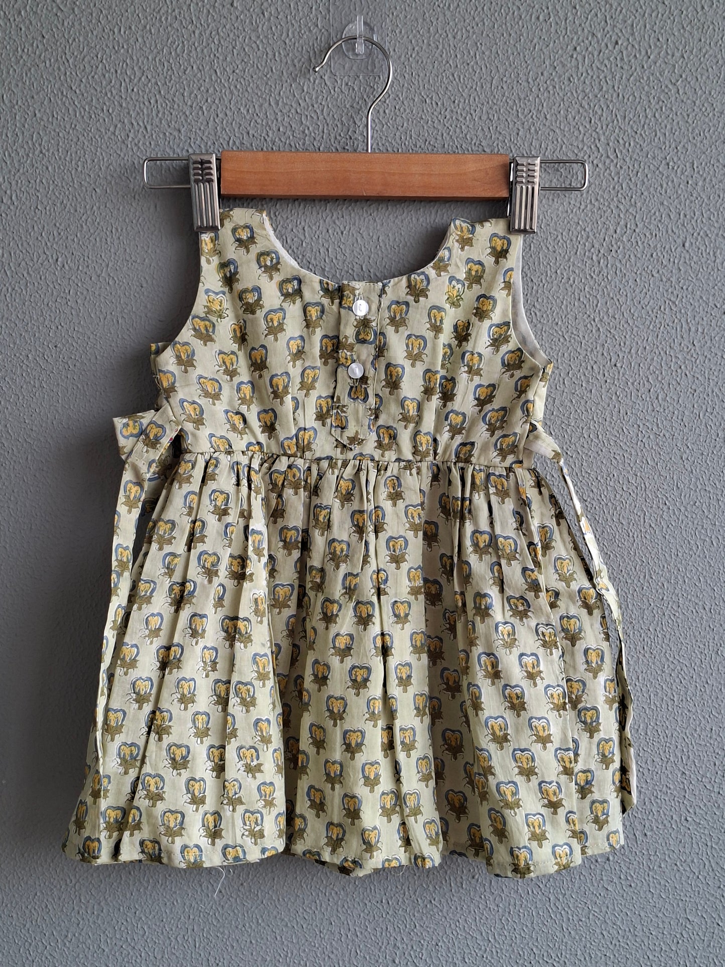 green handblock print baby girl cotton dress back view