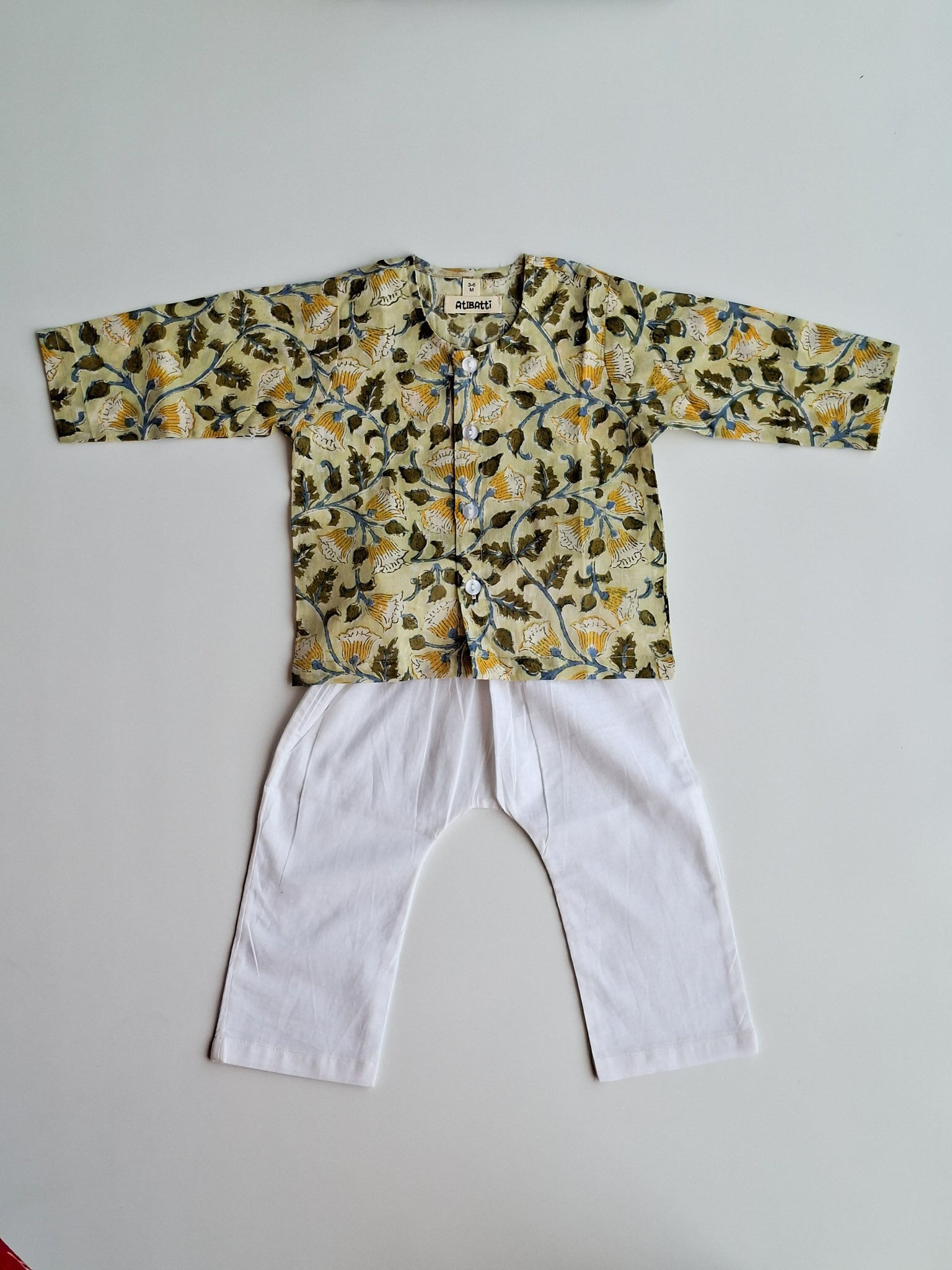 Yellow FLoral handblock printed mulmul cotton jhabla for newborn baby