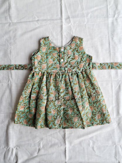 atibatti-green-handblock-baby-girl-cotton-dress-flatlay