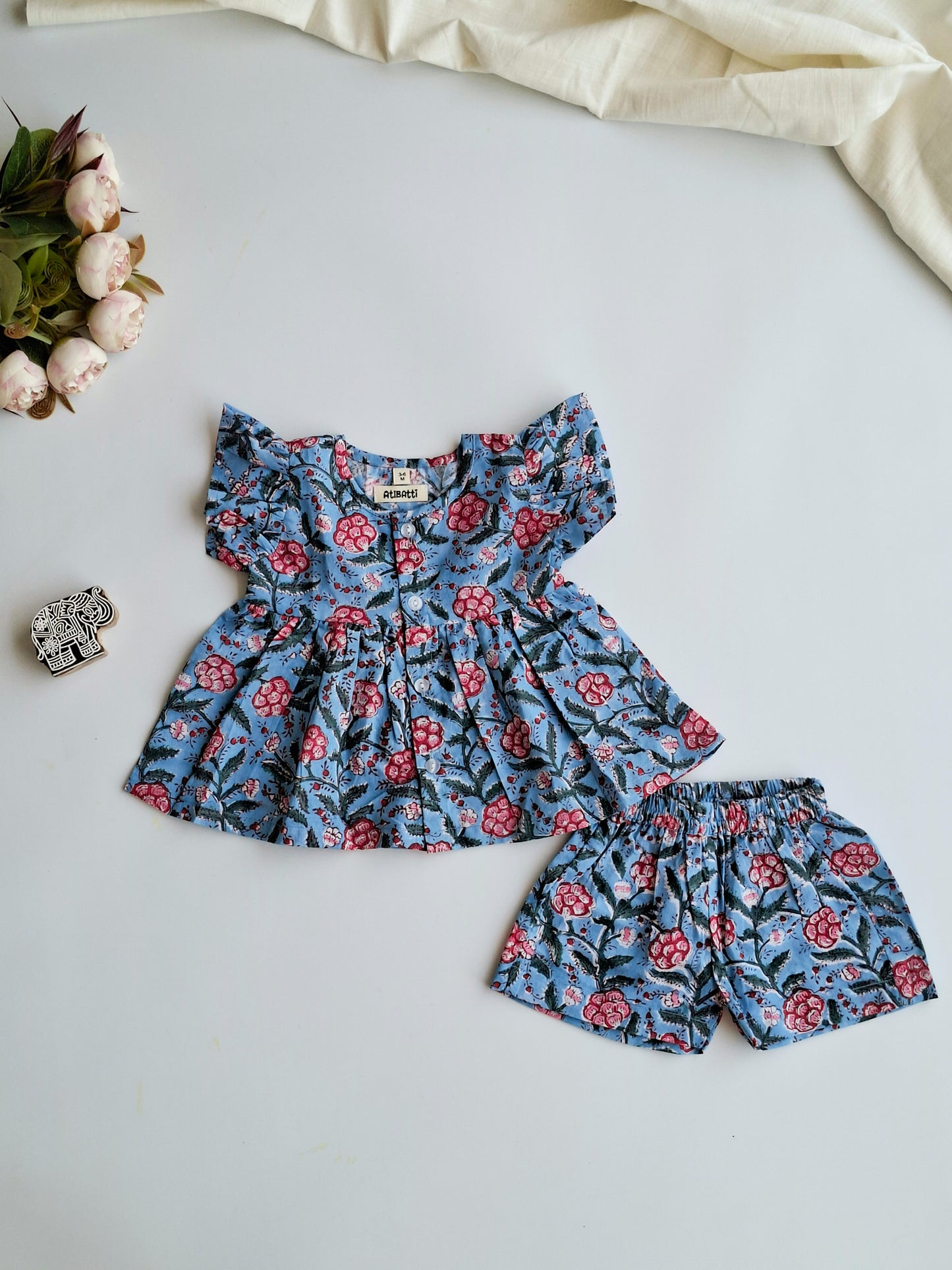 atibatti-newborn-dress-set-blue-handblock-print-flat-lay