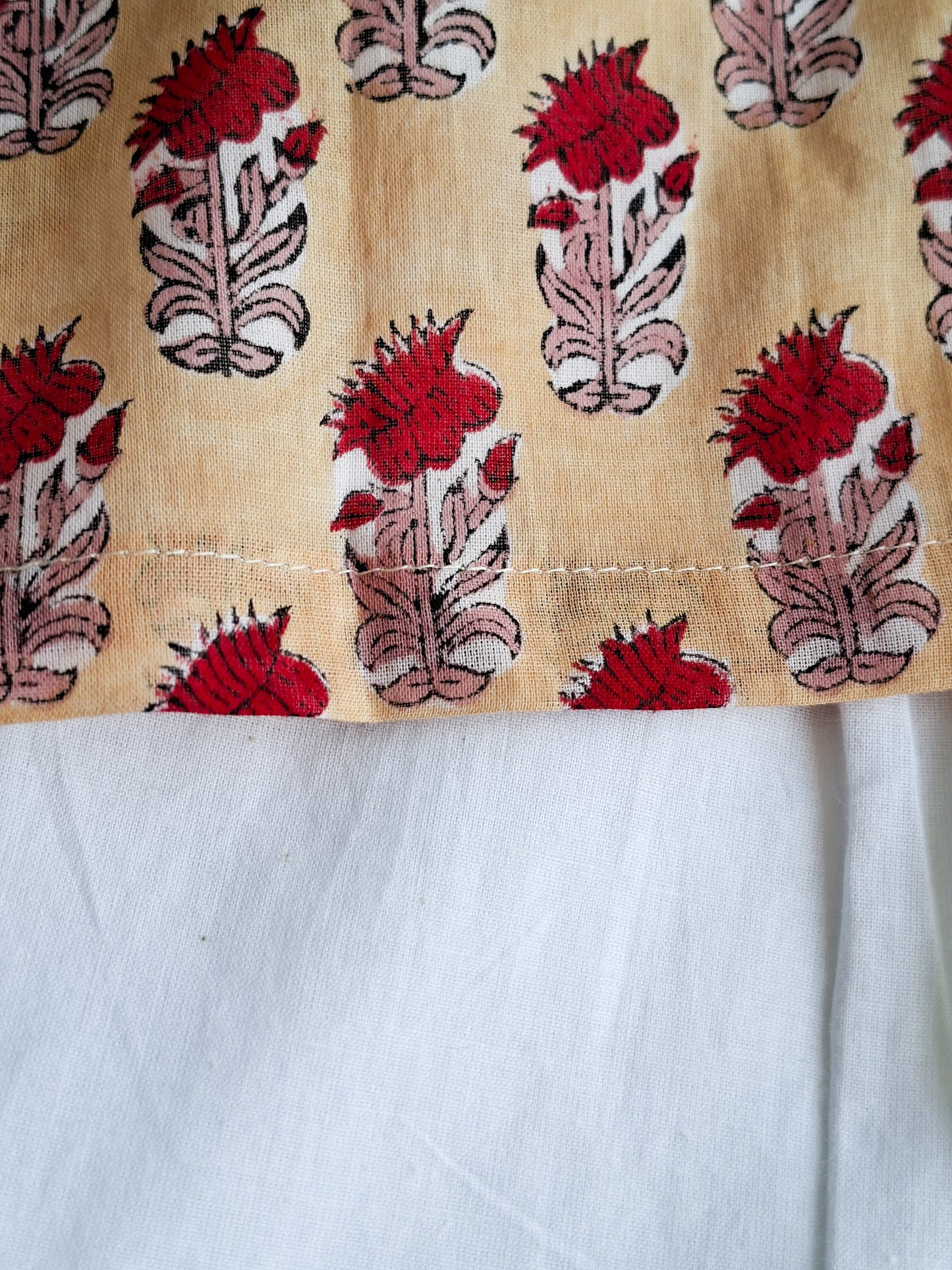 cream rose soft cotton jhabla for newborn with traditional Indian handblock print close view 