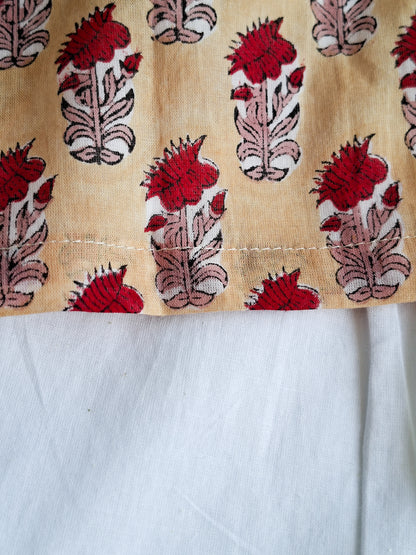 cream rose soft cotton jhabla for newborn with traditional Indian handblock print close view 