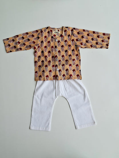 cream rose soft cotton jhabla for newborn with traditional Indian handblock print front view
