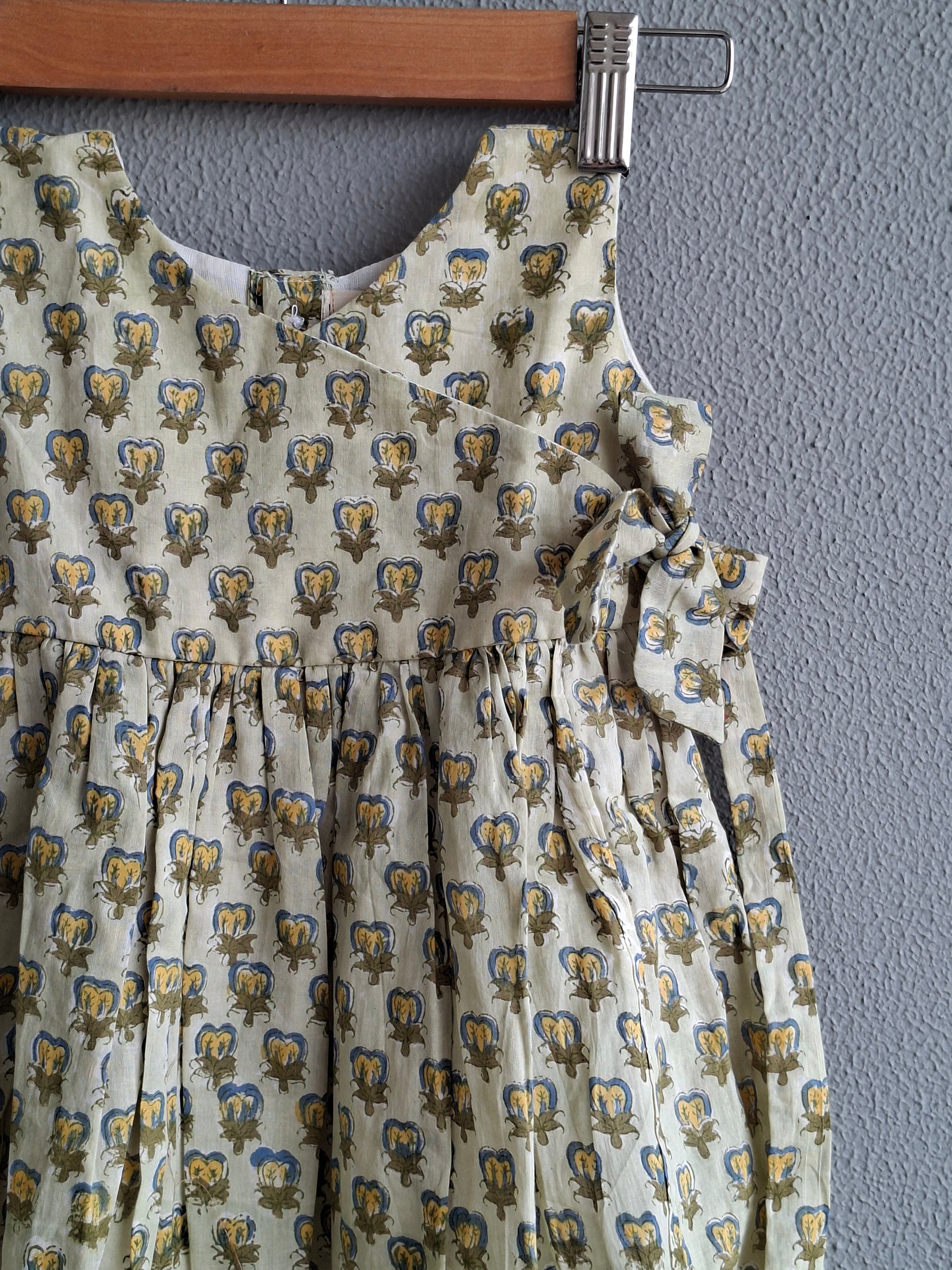 green handblock print baby girl cotton dress close view