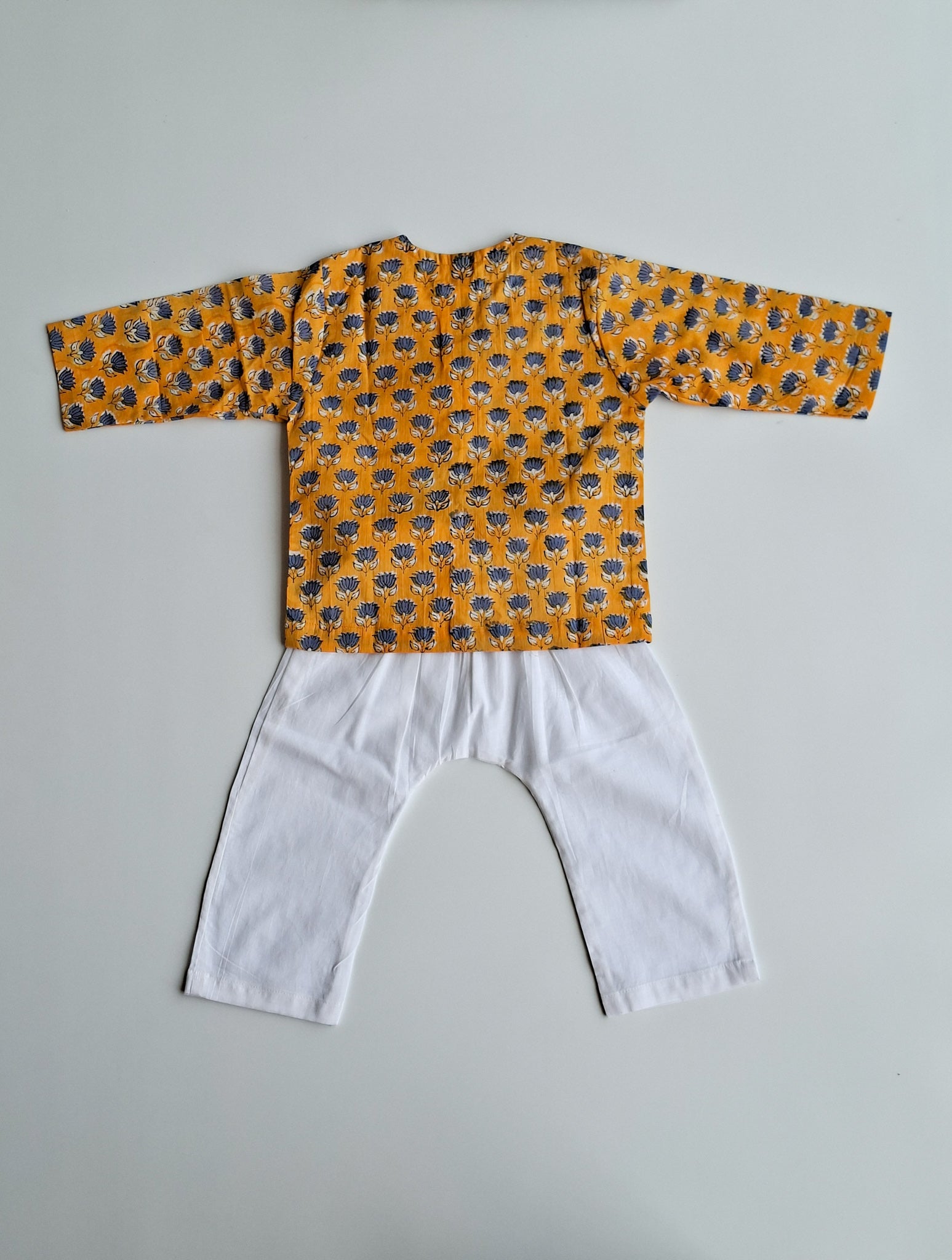 yellow blue lotus soft cotton jhabla for newborn with traditional Indian handblock print back view