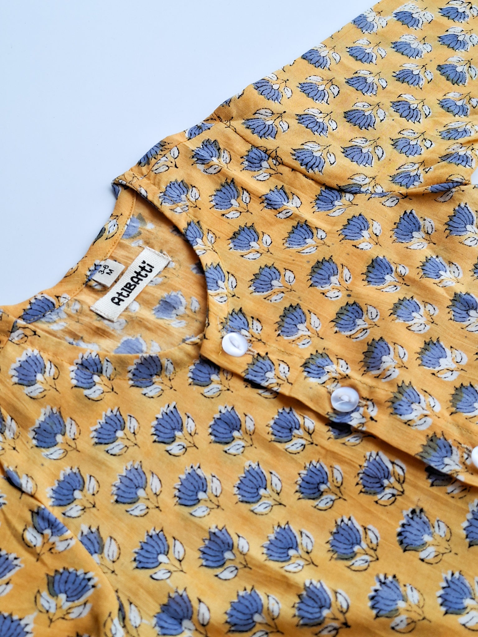 yellow blue lotus soft cotton jhabla for newborn with traditional Indian handblock print close view