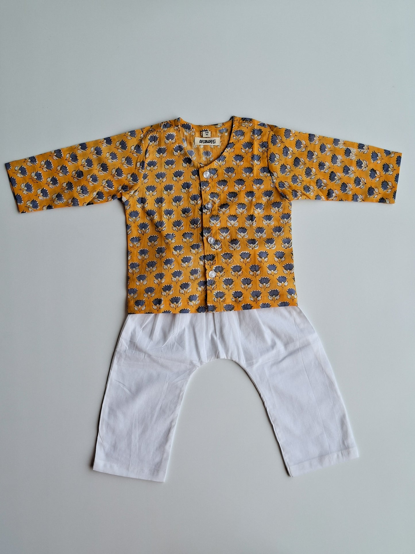 yellow blue lotus soft cotton jhabla for newborn with traditional Indian handblock print front view