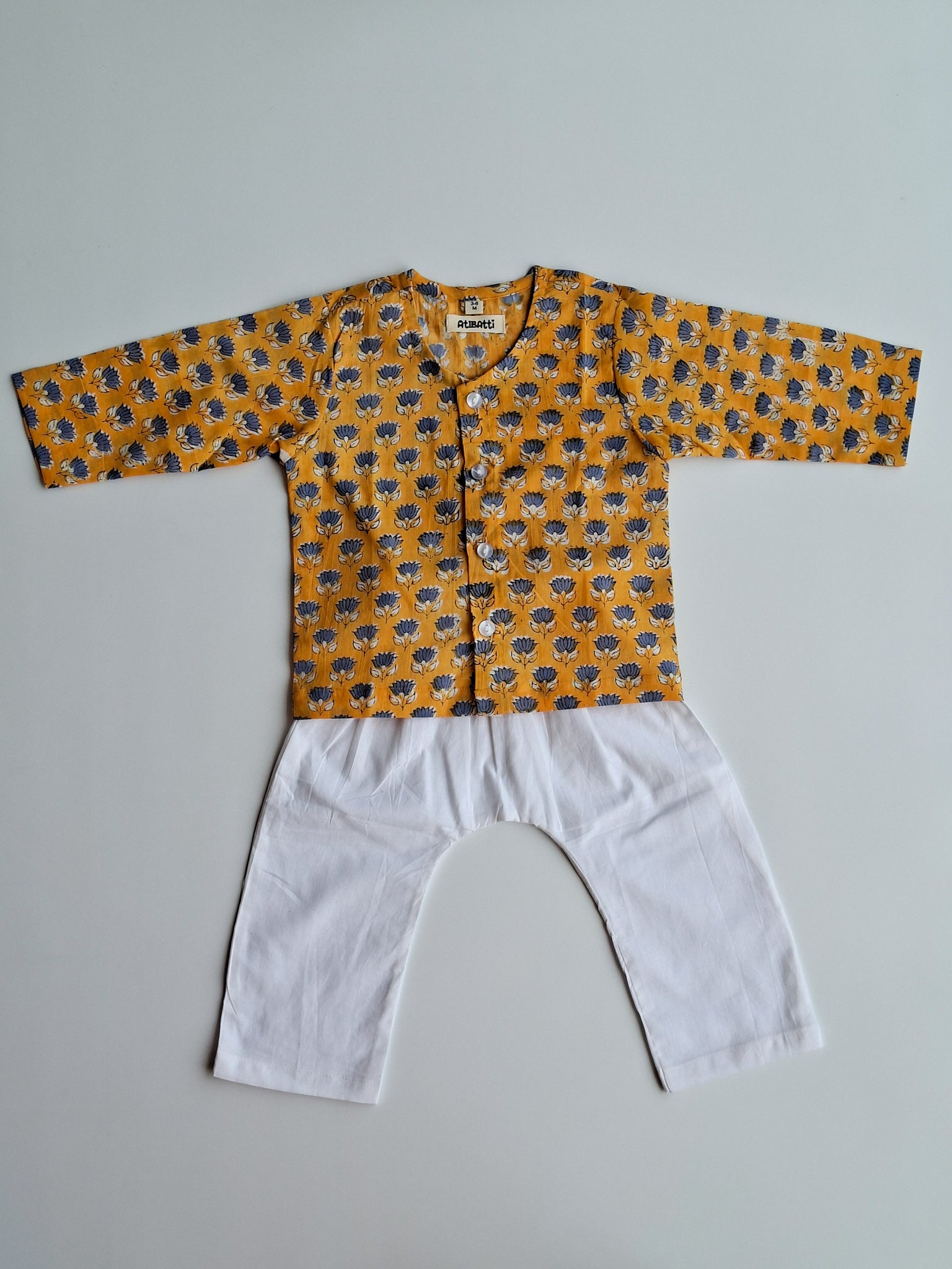 yellow blue lotus soft cotton jhabla for newborn with traditional Indian handblock print front view