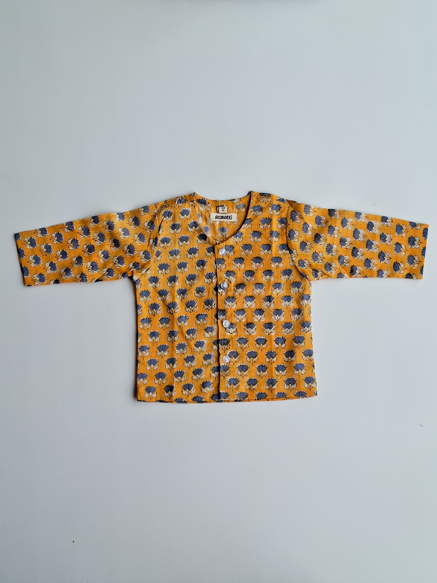 yellow blue lotus soft cotton jhabla for newborn with traditional Indian handblock print top view